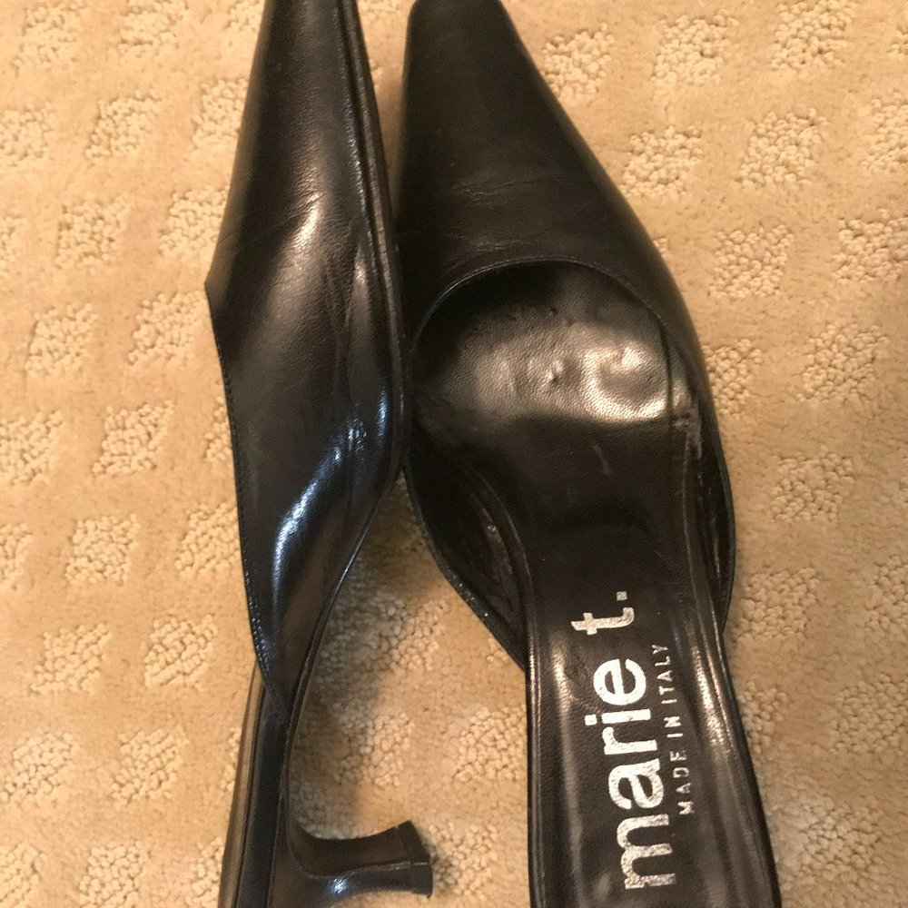 European open back medium heels.